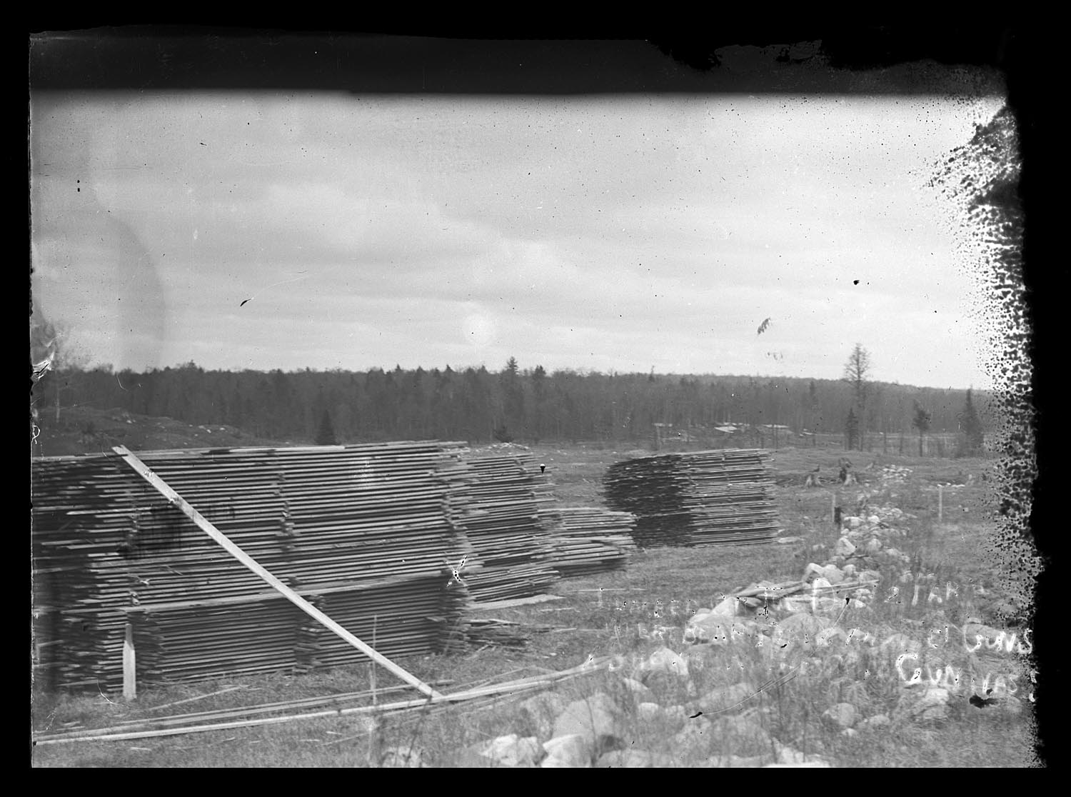 Lumber pile where Oscar Harp died