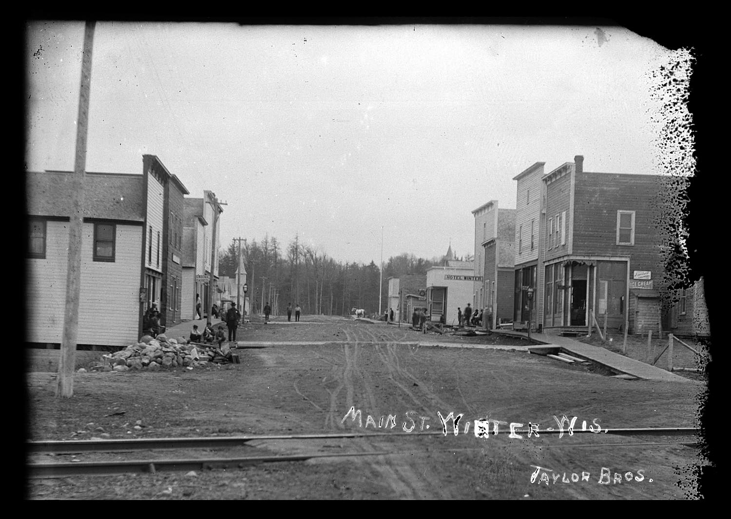 Winter Main Street Looking South = post stand off = Taylor Bros Photo